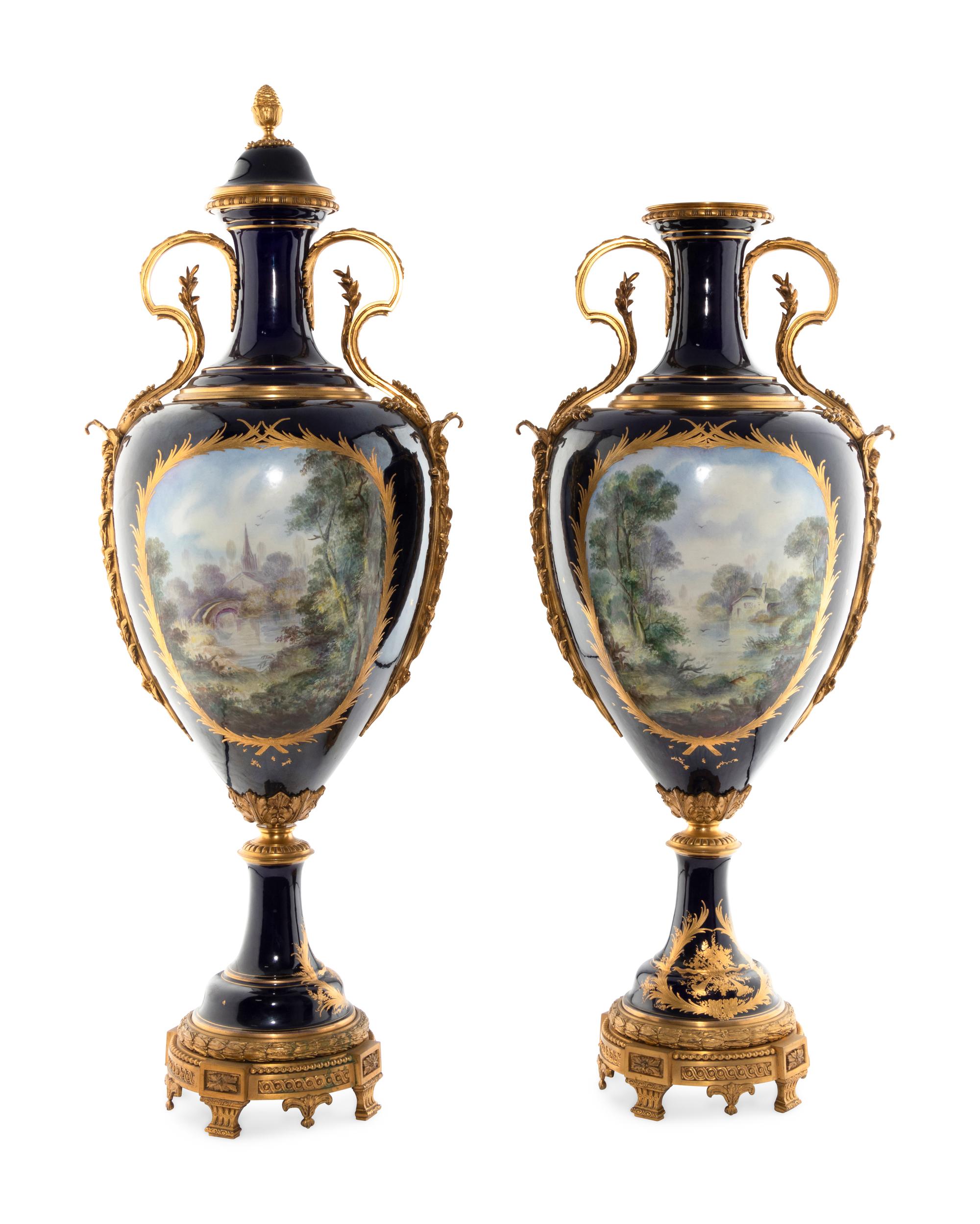 A Pair of Gilt Bronze Mounted Sèvres Style Porcelain Urns