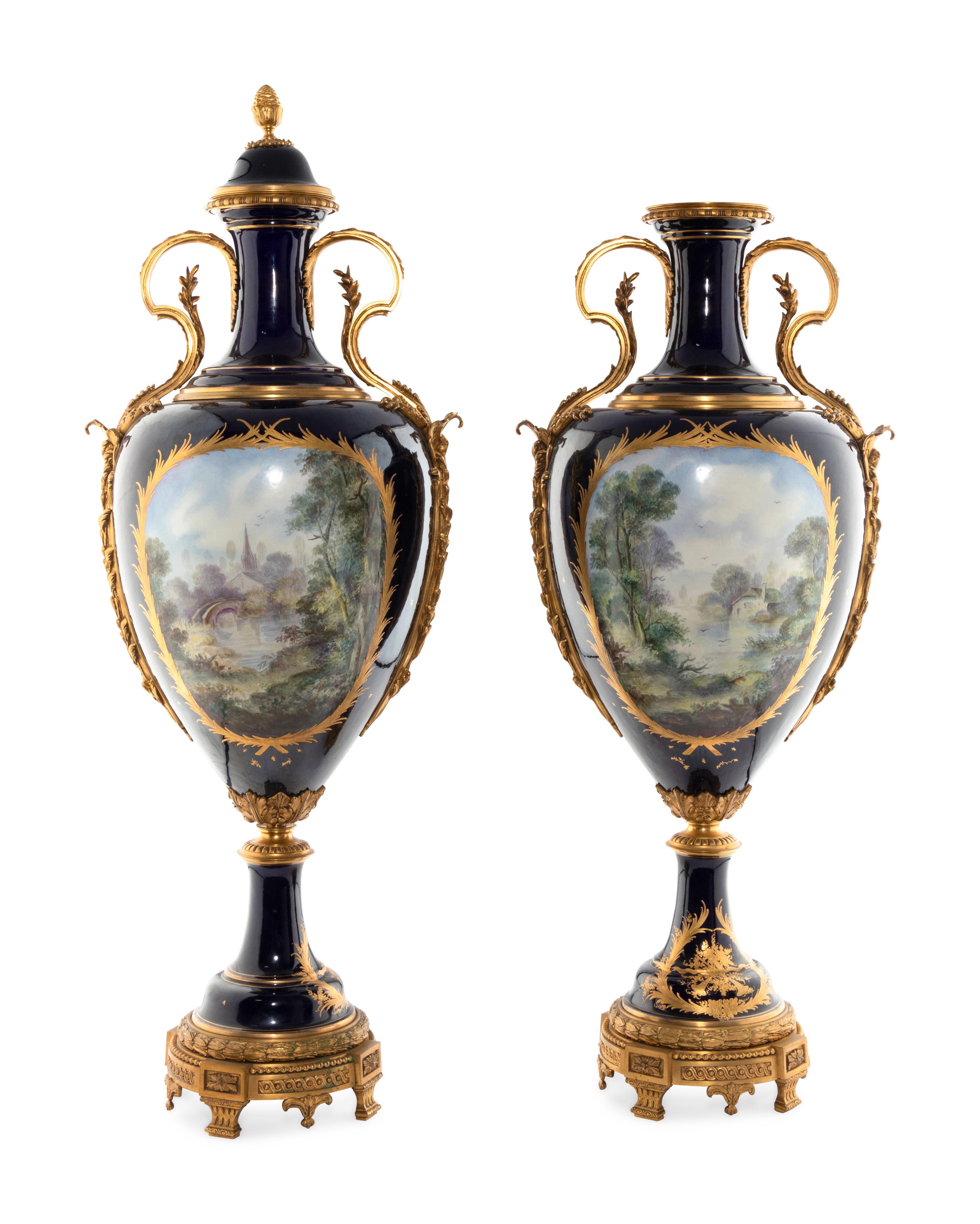 A Pair of Gilt Bronze Mounted Sèvres Style Porcelain Urns
