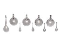 A Set of Four Georg Jensen Silver Salt Cellars and Spoons