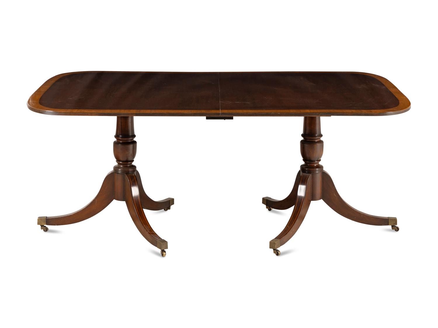 A Regency Style Mahogany Double-Pedestal Dining Table