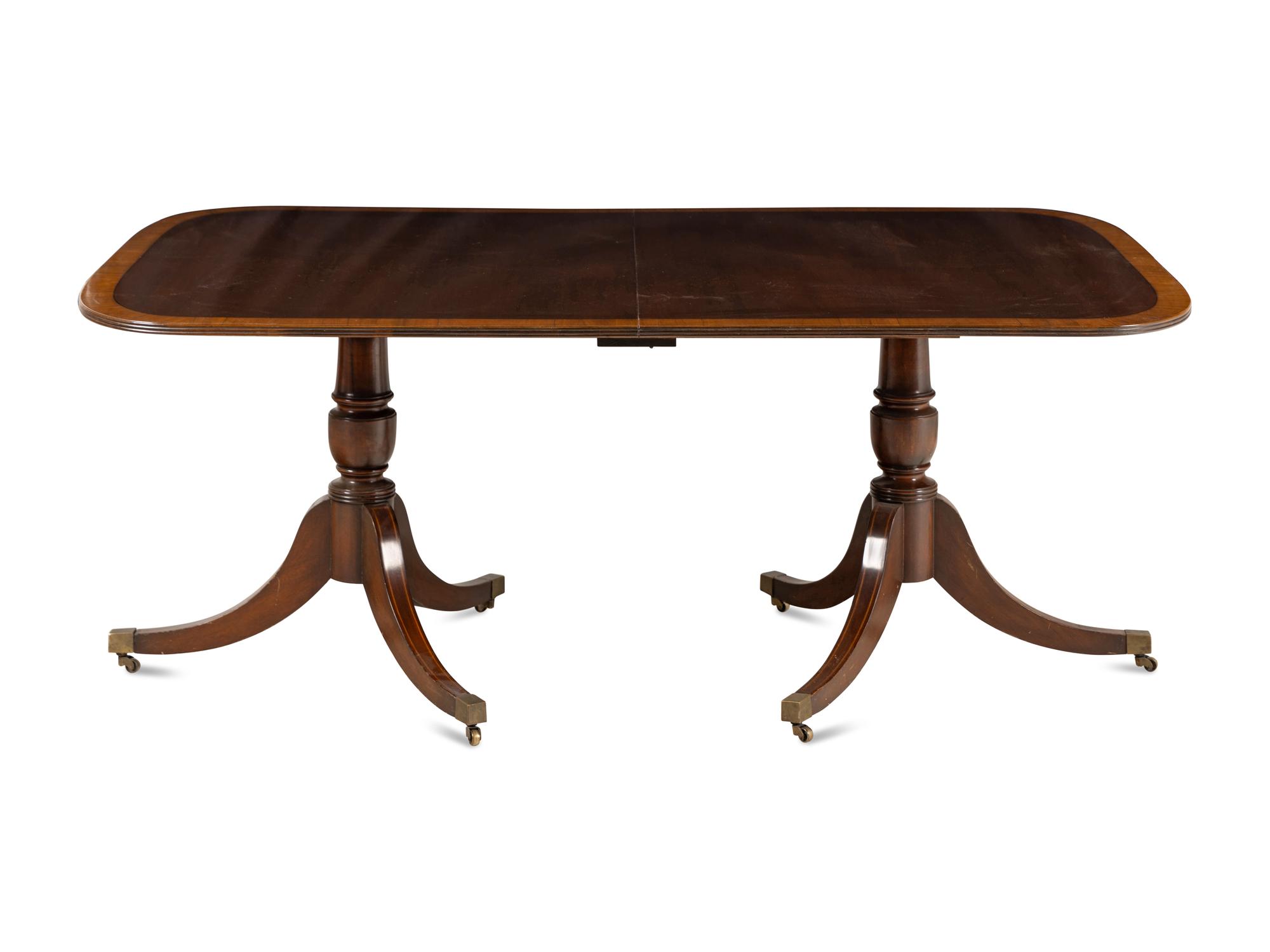 A Regency Style Mahogany Double-Pedestal Dining Table