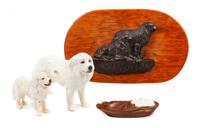 A Group of Four Great Pyrenees Figures Width of widest 13 1/2 inches.