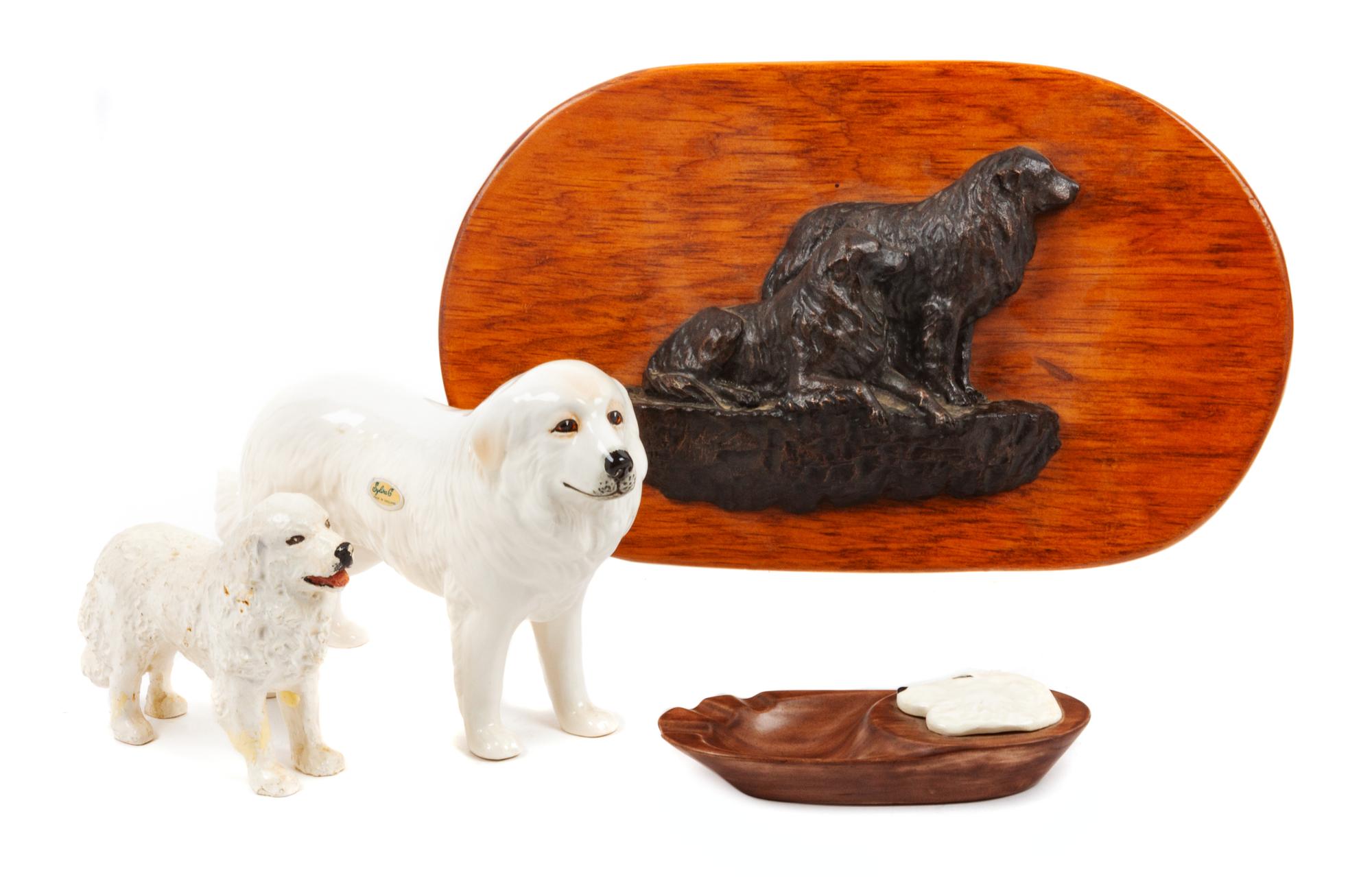 A Group of Four Great Pyrenees Figures Width of widest 13 1/2 inches.