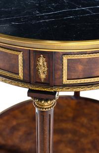 A Louis XVI Style Gilt Metal Mounted Marble-Top Mahogany Guéridon