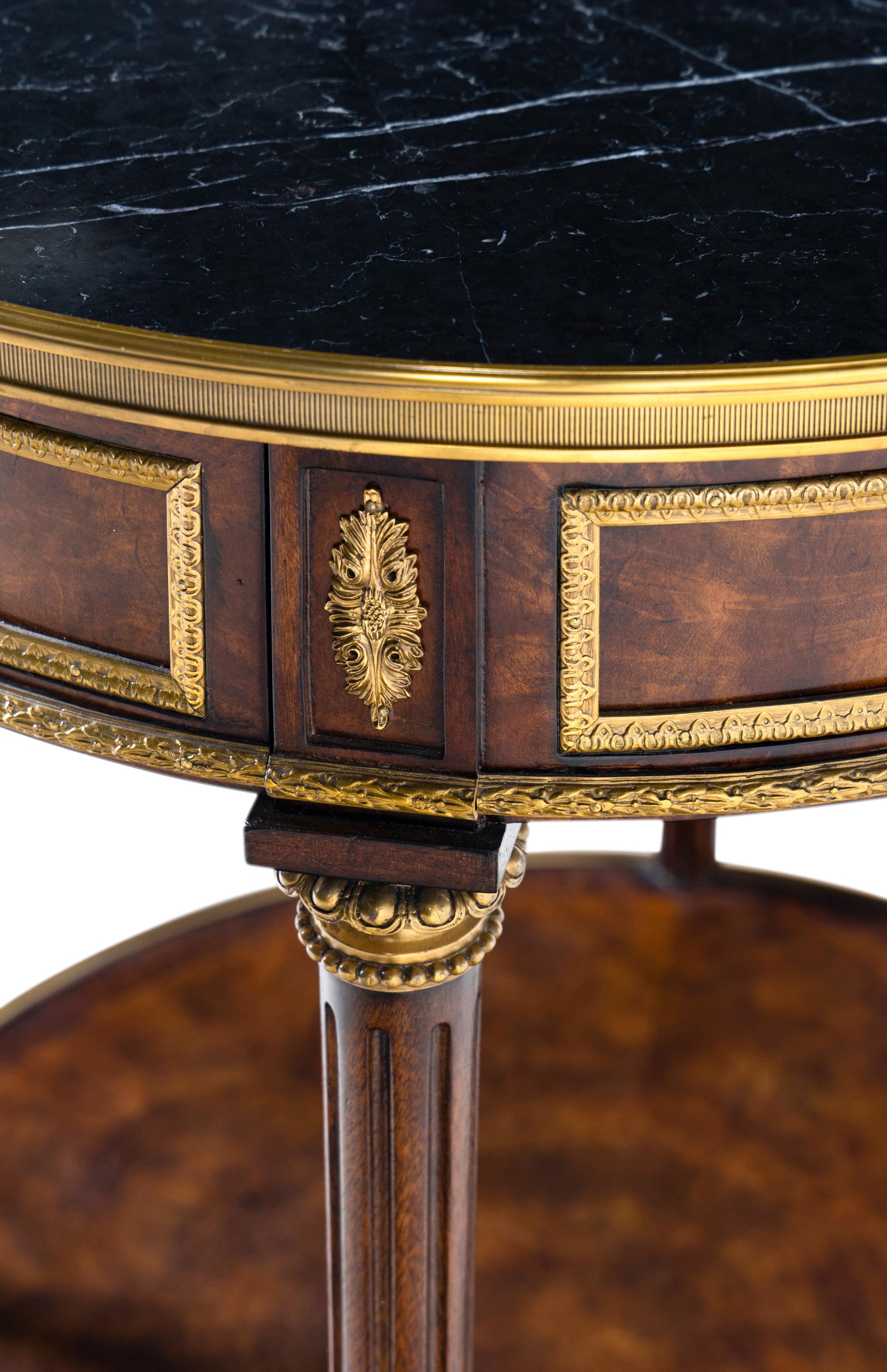 A Louis XVI Style Gilt Metal Mounted Marble-Top Mahogany Guéridon