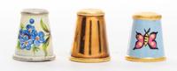 A Collection of Metal Thimbles Height of tallest 3/4 inch.