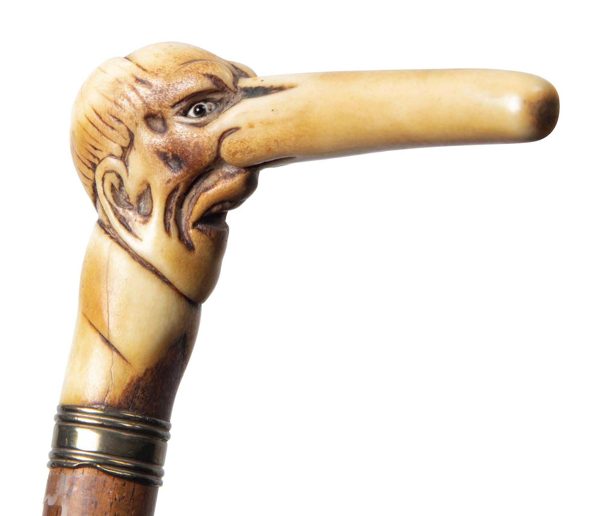 Three Carved Horn or Bone and Brass-Mounted Figural Canes