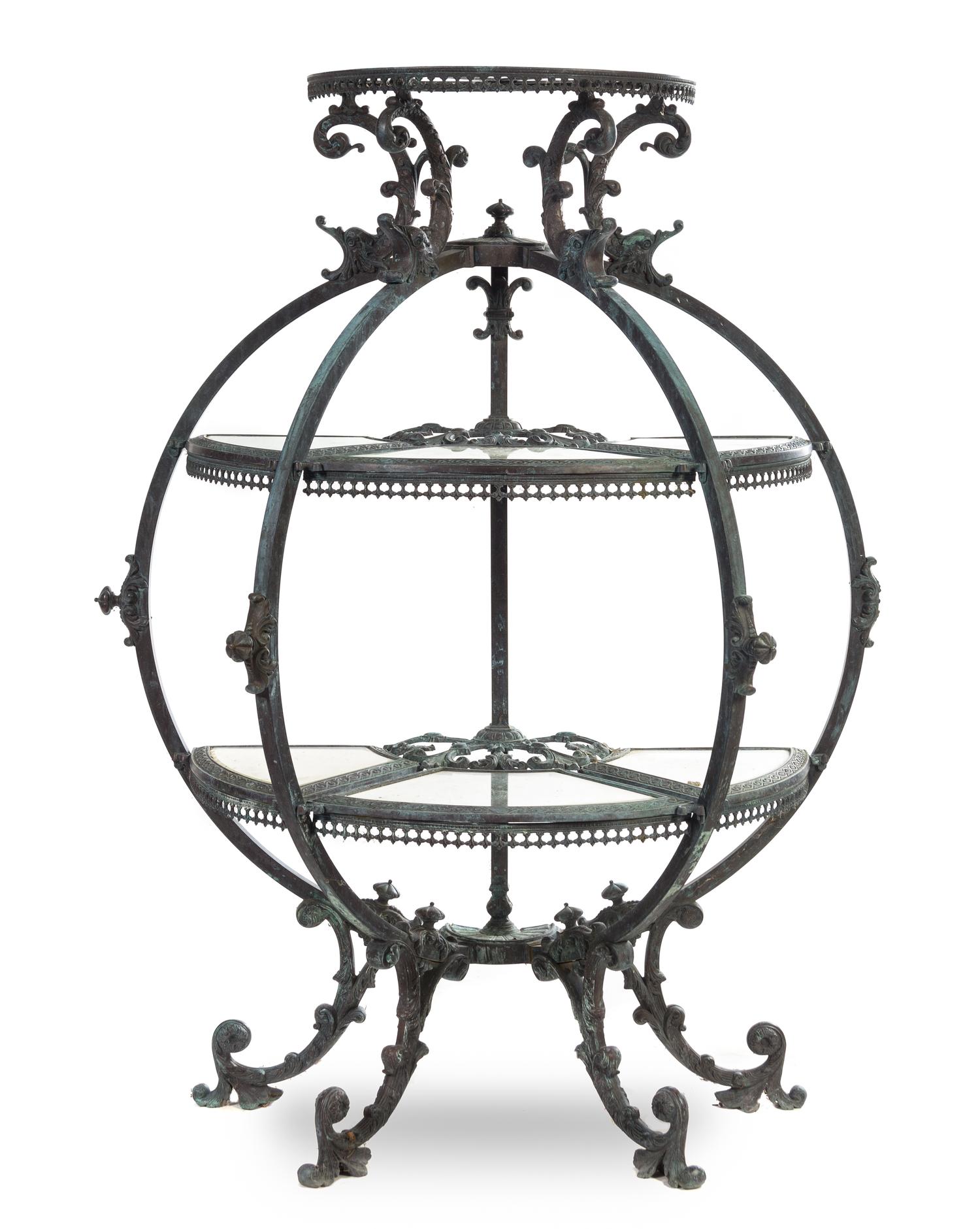 A Neoclassical Cast Metal Garden Etagere Height 53 1/4 x width 40 x depth 17 inches.