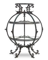 A Neoclassical Cast Metal Garden Etagere Height 53 1/4 x width 40 x depth 17 inches.