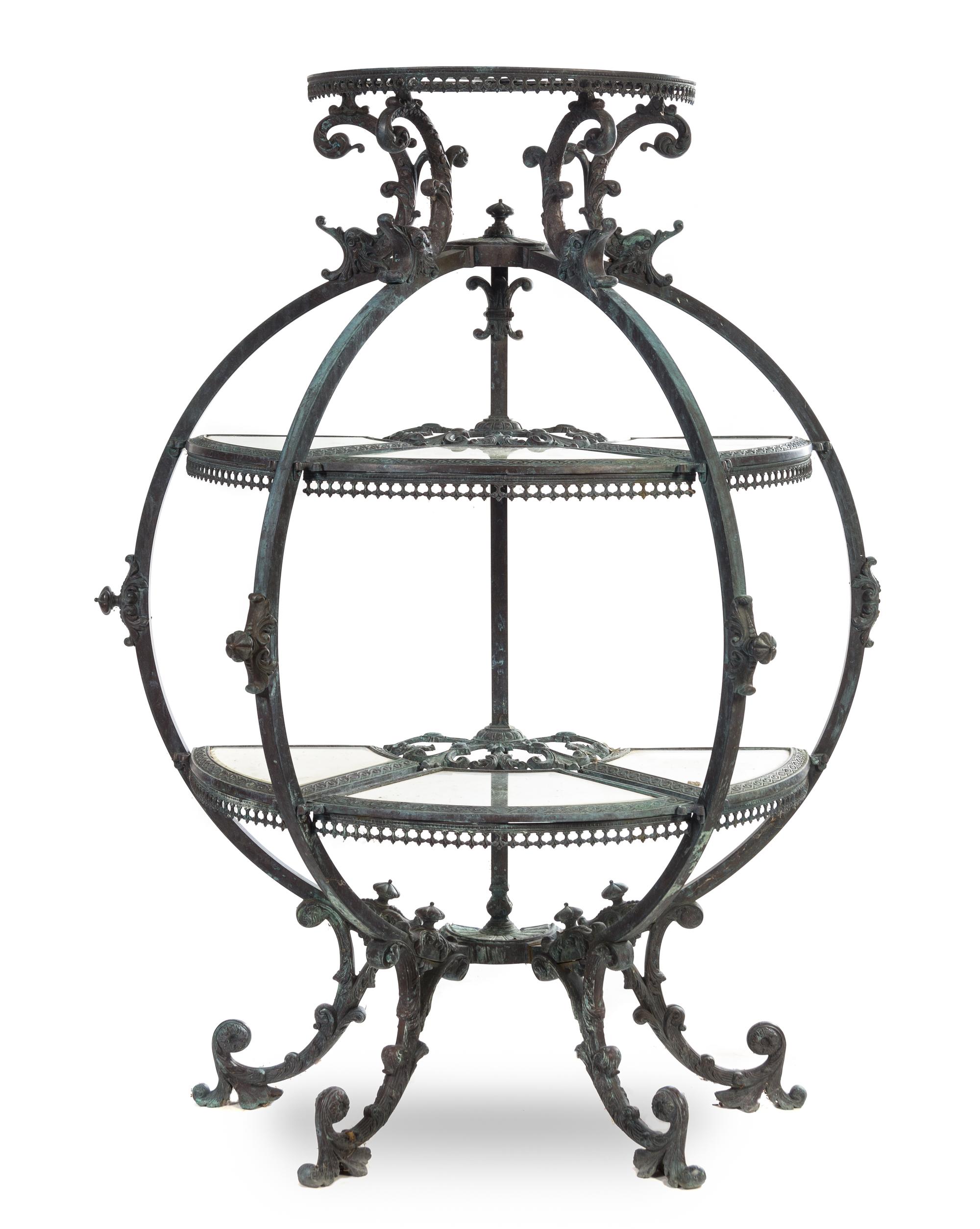 A Neoclassical Cast Metal Garden Etagere Height 53 1/4 x width 40 x depth 17 inches.