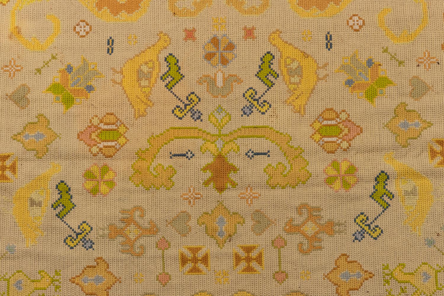 A Portuguese Needlepoint Rug