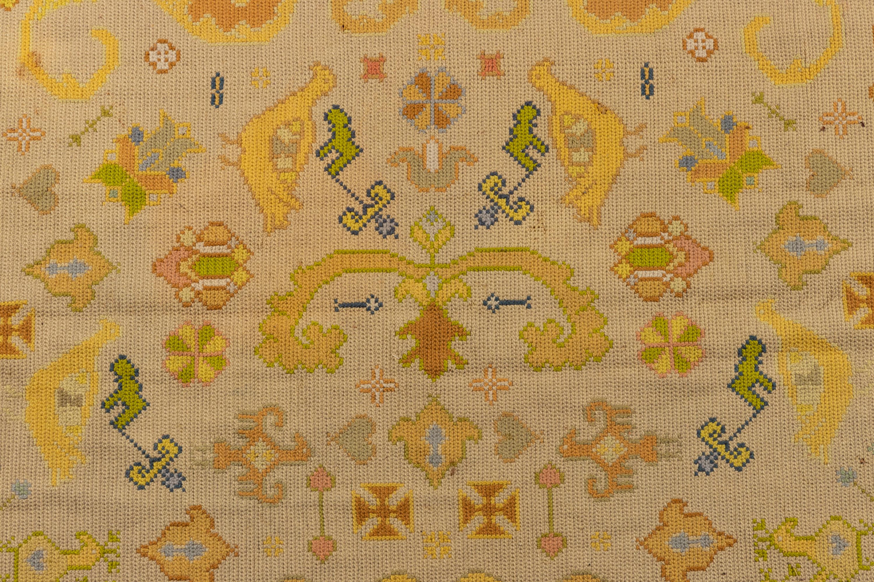 A Portuguese Needlepoint Rug