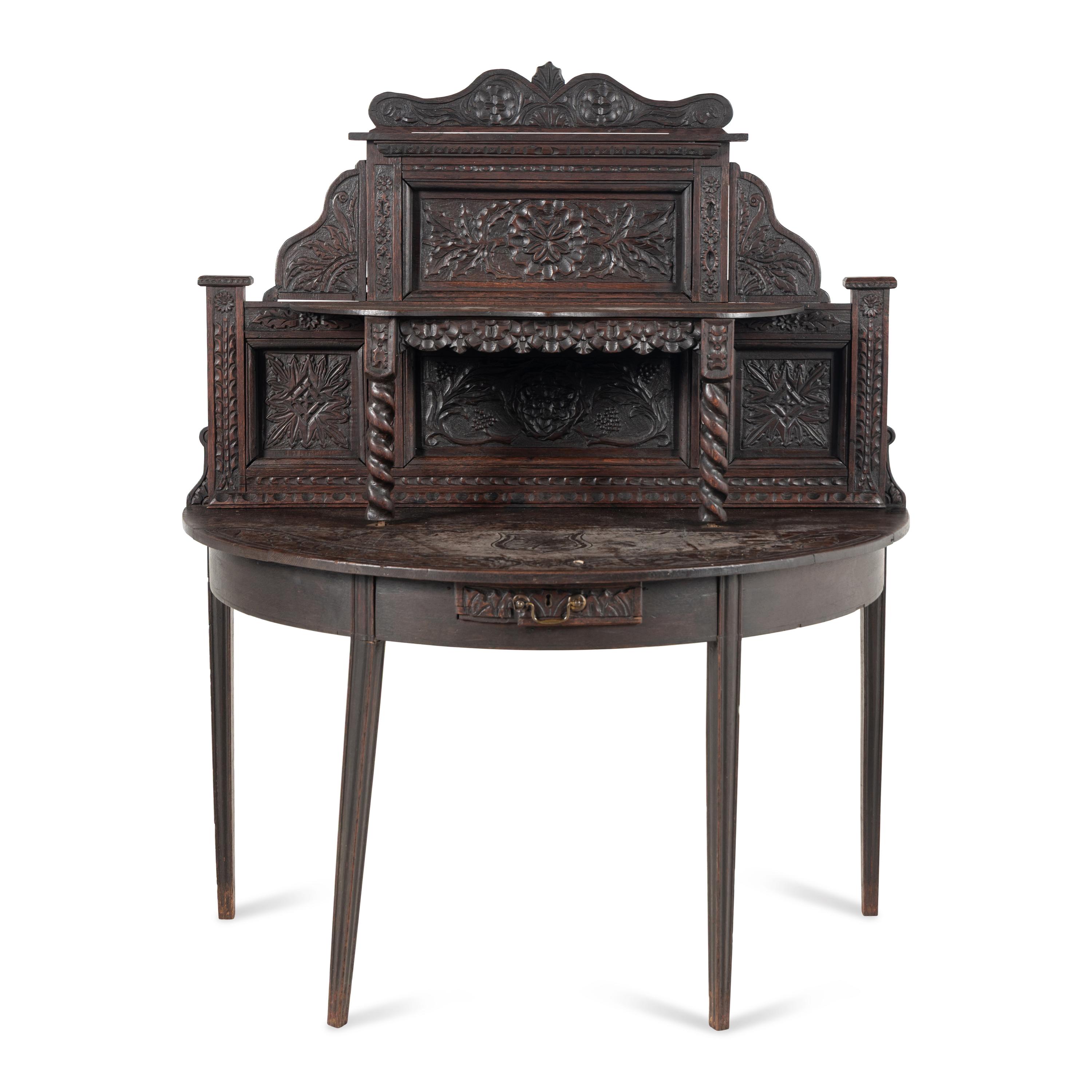 A Continental Carved Oak Serving Table
