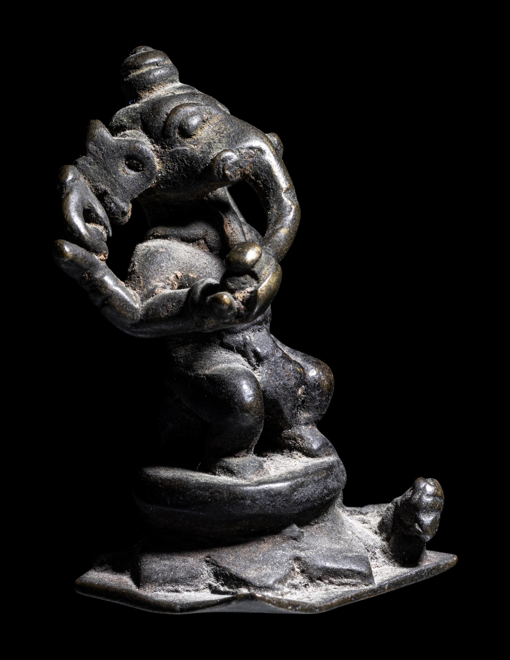 A Small Indian Bronze Figure of Ganesha