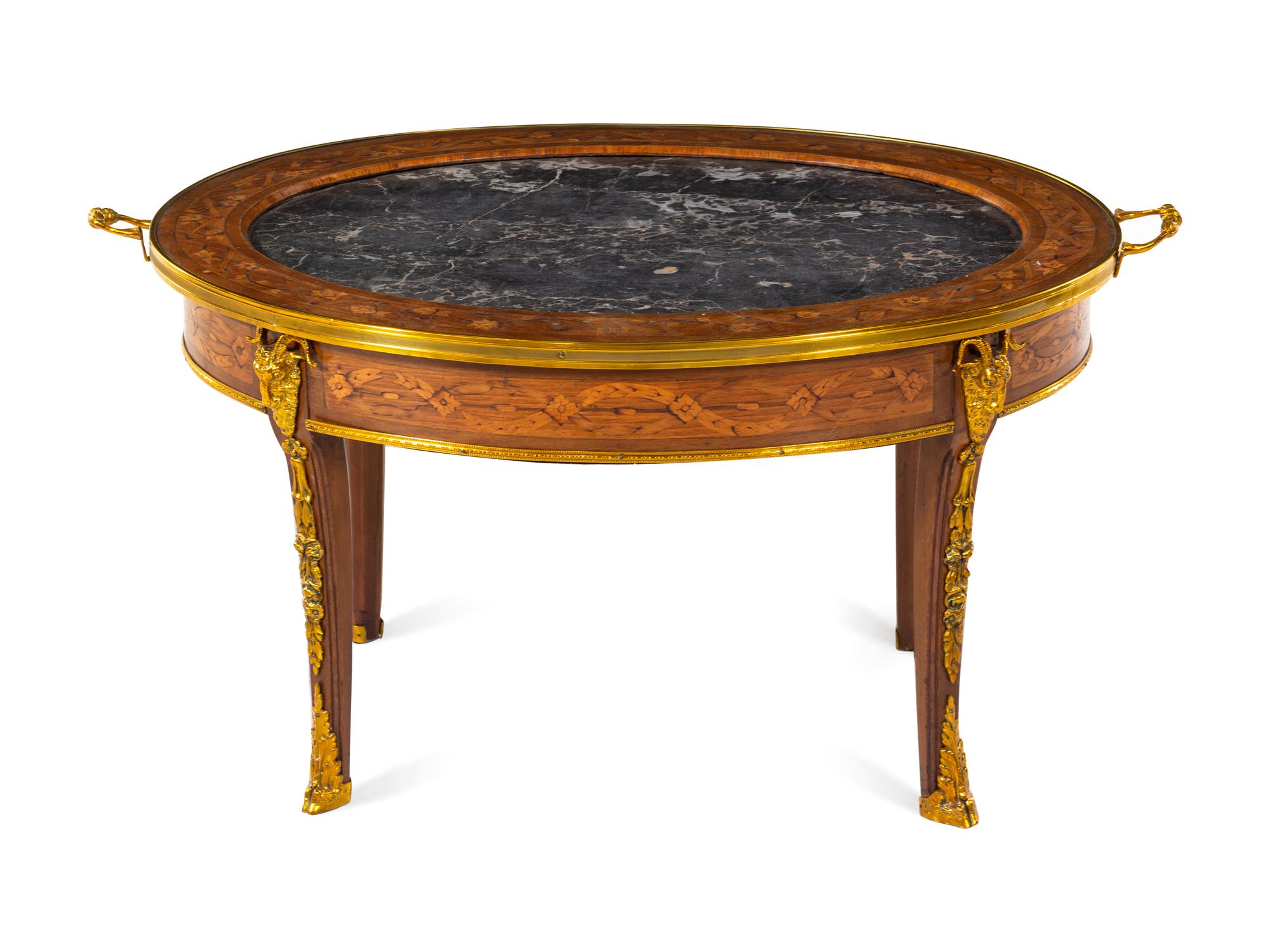 A Louis XVI Style Gilt Metal Mounted Marquetry Low Table