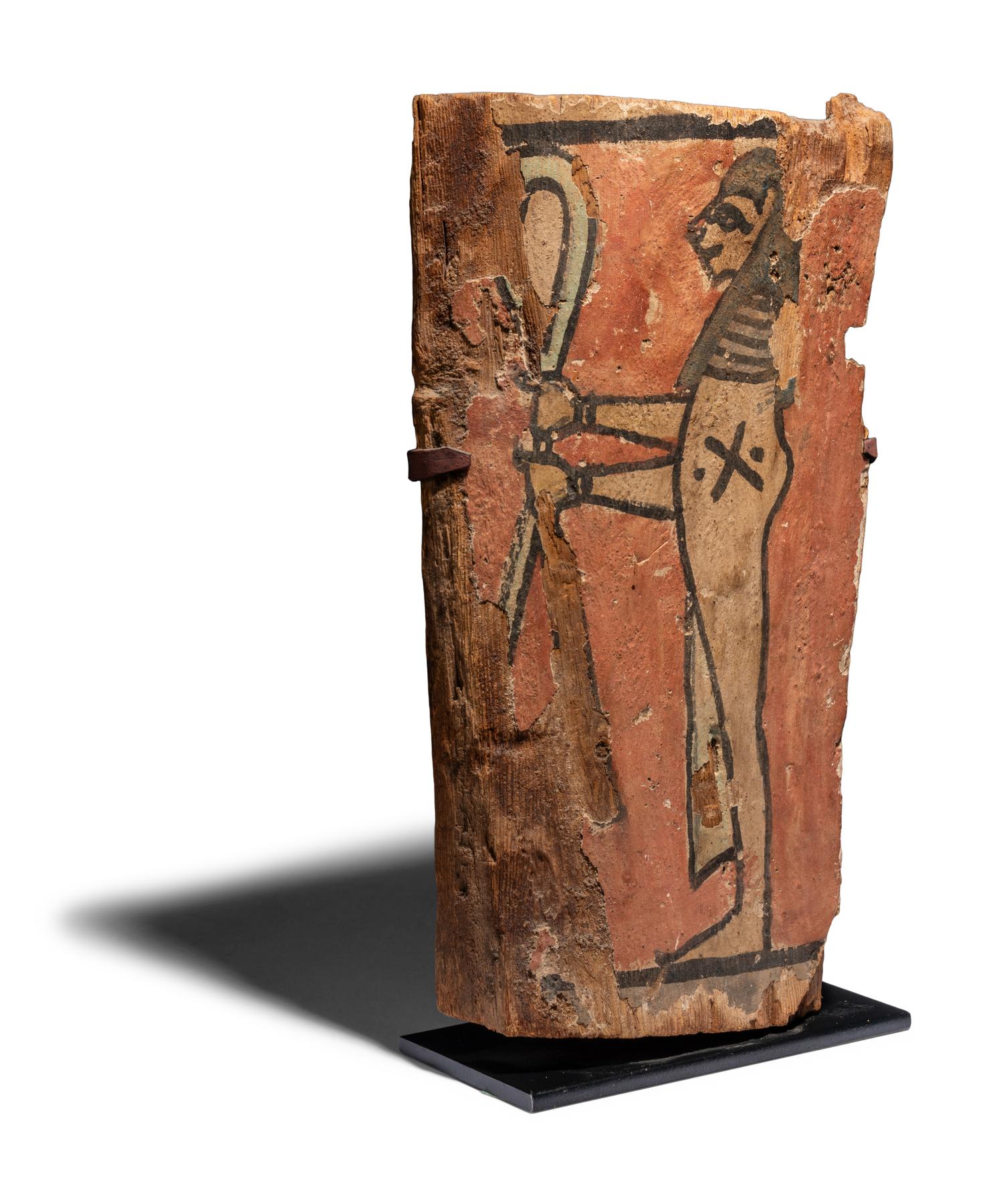 An Egyptian Painted Wood Sarcophagus Fragment