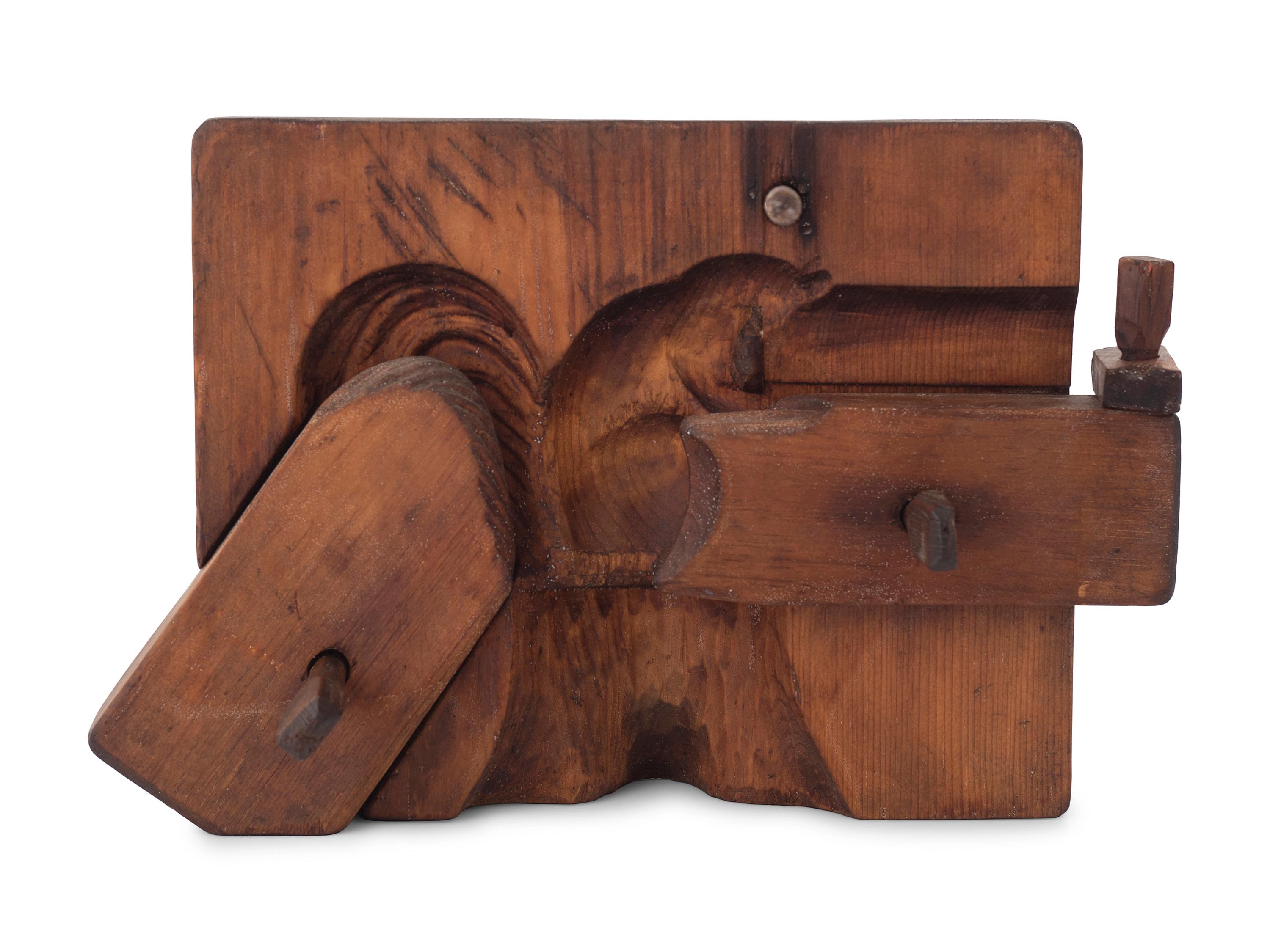 A Two-Part Carved Pine Squirrel Form Butter Mold