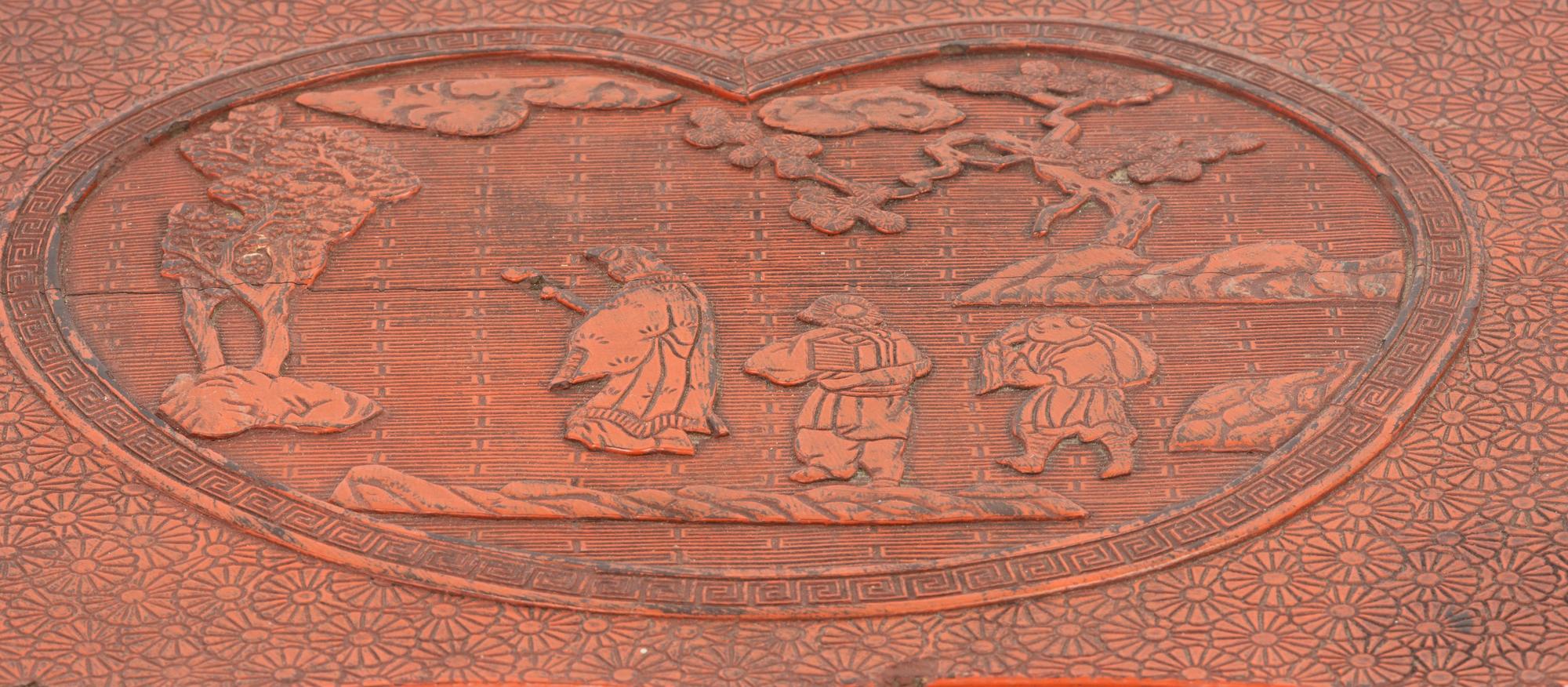 A Chinese Red Lacquered Wood Side Stand