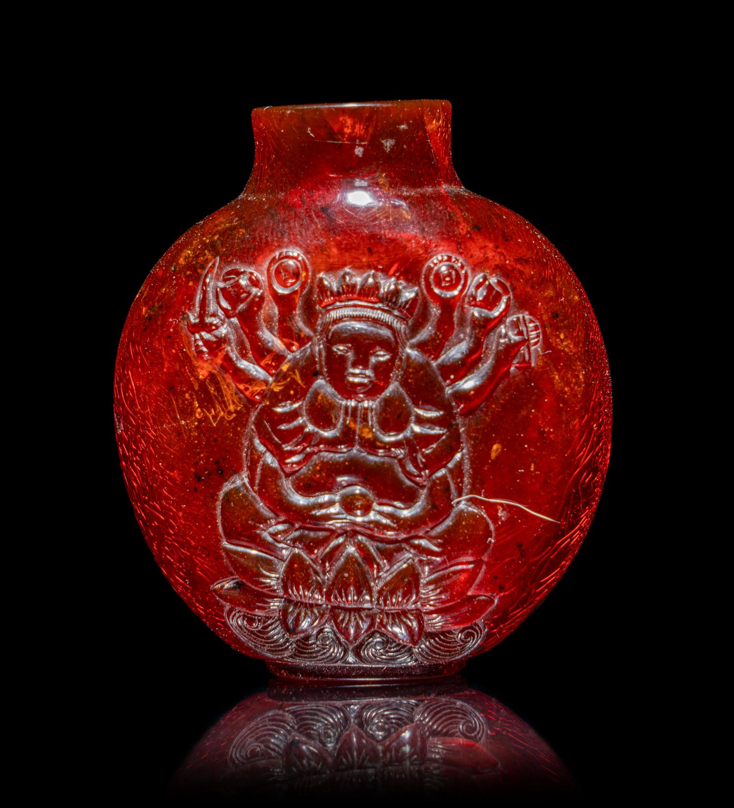 A Chinese Carved Amber Snuff Bottle
