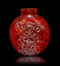 A Chinese Carved Amber Snuff Bottle