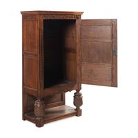 A Baroque Style Carved Oak Cabinet