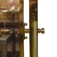 A Brass Dressing Mirror 46" W x 19" D x 76.5" H — France, Circa 1930