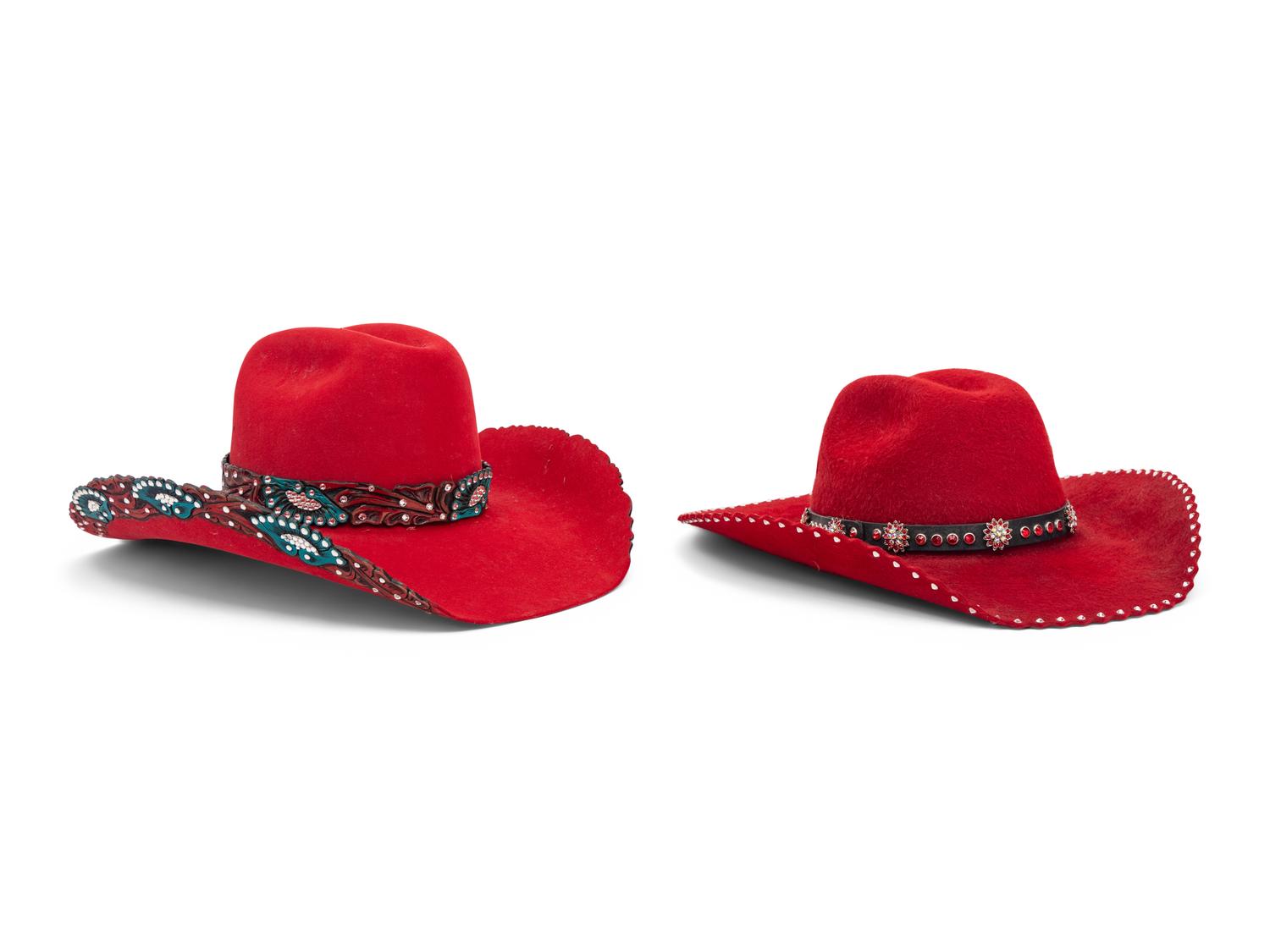 Two Red Western Hats and Hat Case