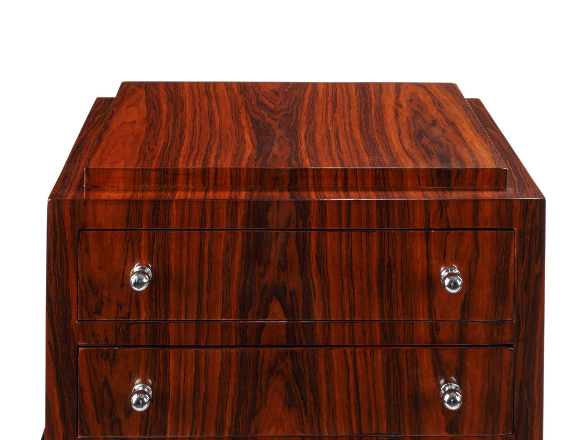 A Pair of Art Deco Style Part-Ebonized Rosewood Tall Chests of Drawers