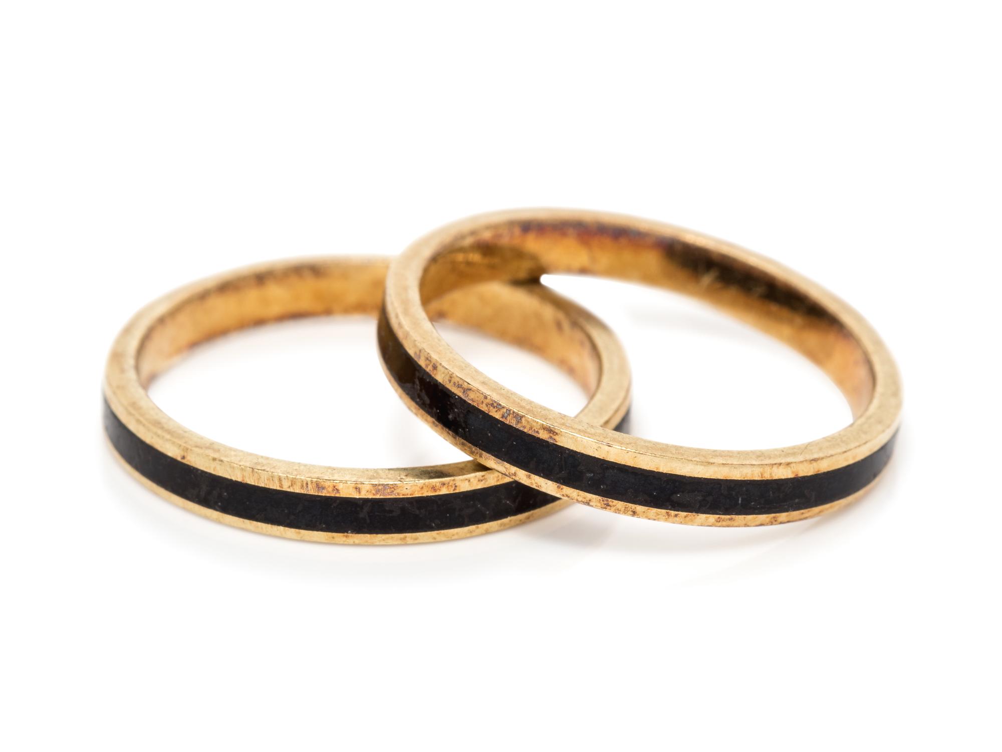 A Pair of 14 Karat Yellow Gold and Enamel Rings,