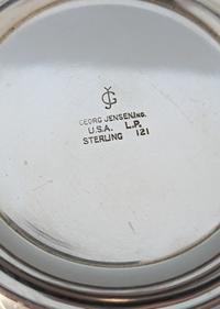 A Pair of Georg Jensen Silver Two-Light Candelabra