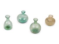 A Group of Four Roman and Islamic Glass Vessels