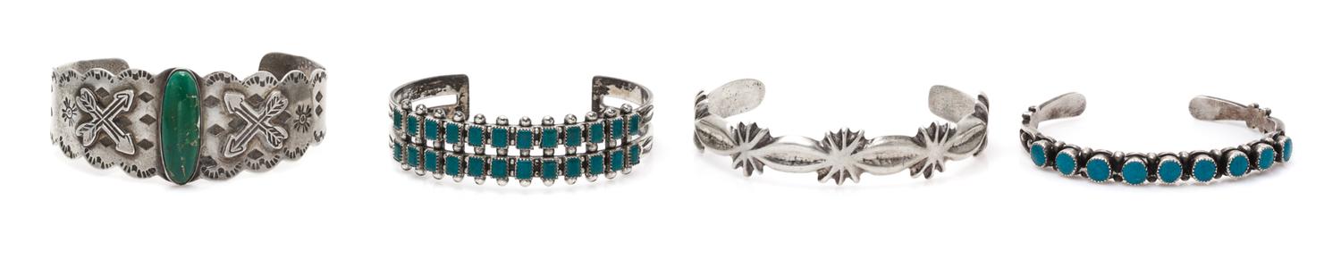 A Collection of Sterling Silver and Turquoise Bangle Bracelets, 62.30 dwts.