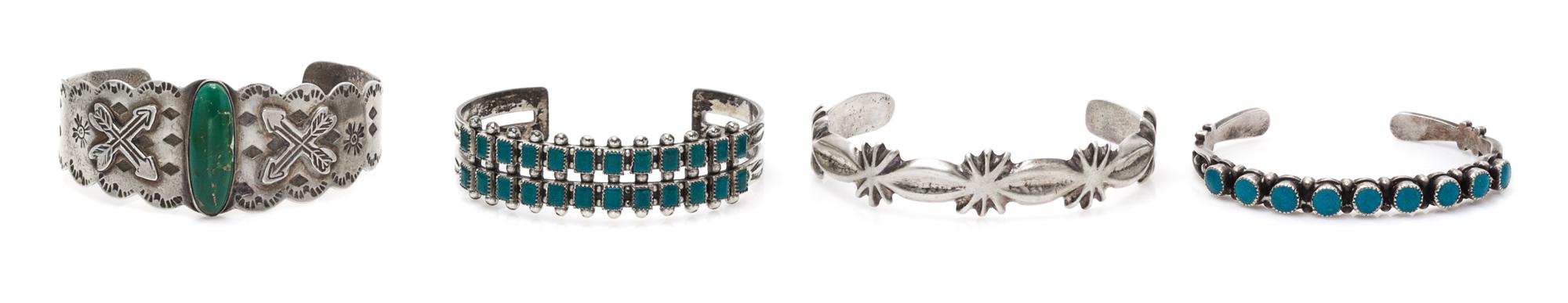A Collection of Sterling Silver and Turquoise Bangle Bracelets, 62.30 dwts.
