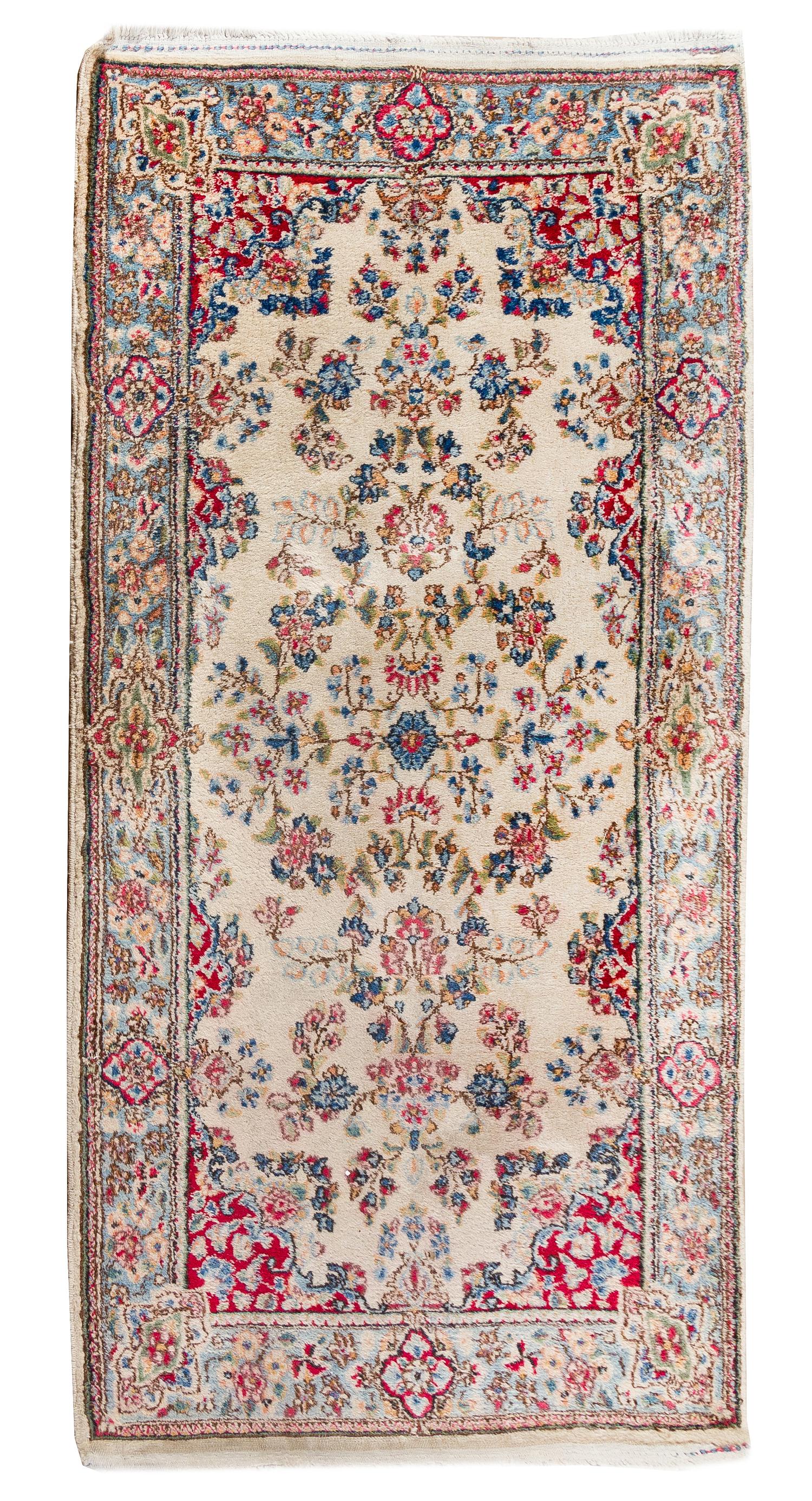 A Kirman Wool Rug 4 feet 10 inches x 2 feet 6 inches. — MID 20TH CENTURY