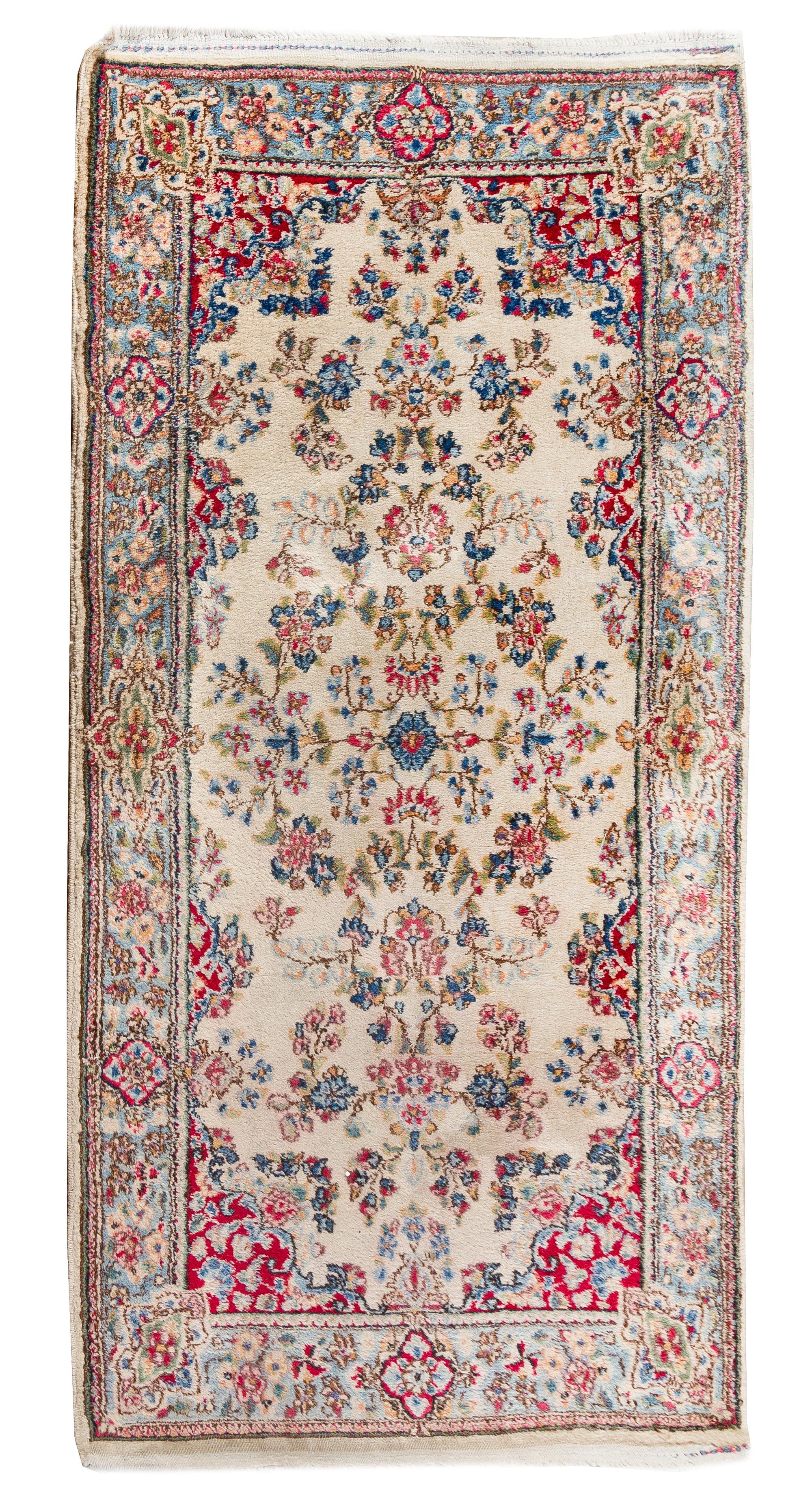 A Kirman Wool Rug 4 feet 10 inches x 2 feet 6 inches. — MID 20TH CENTURY