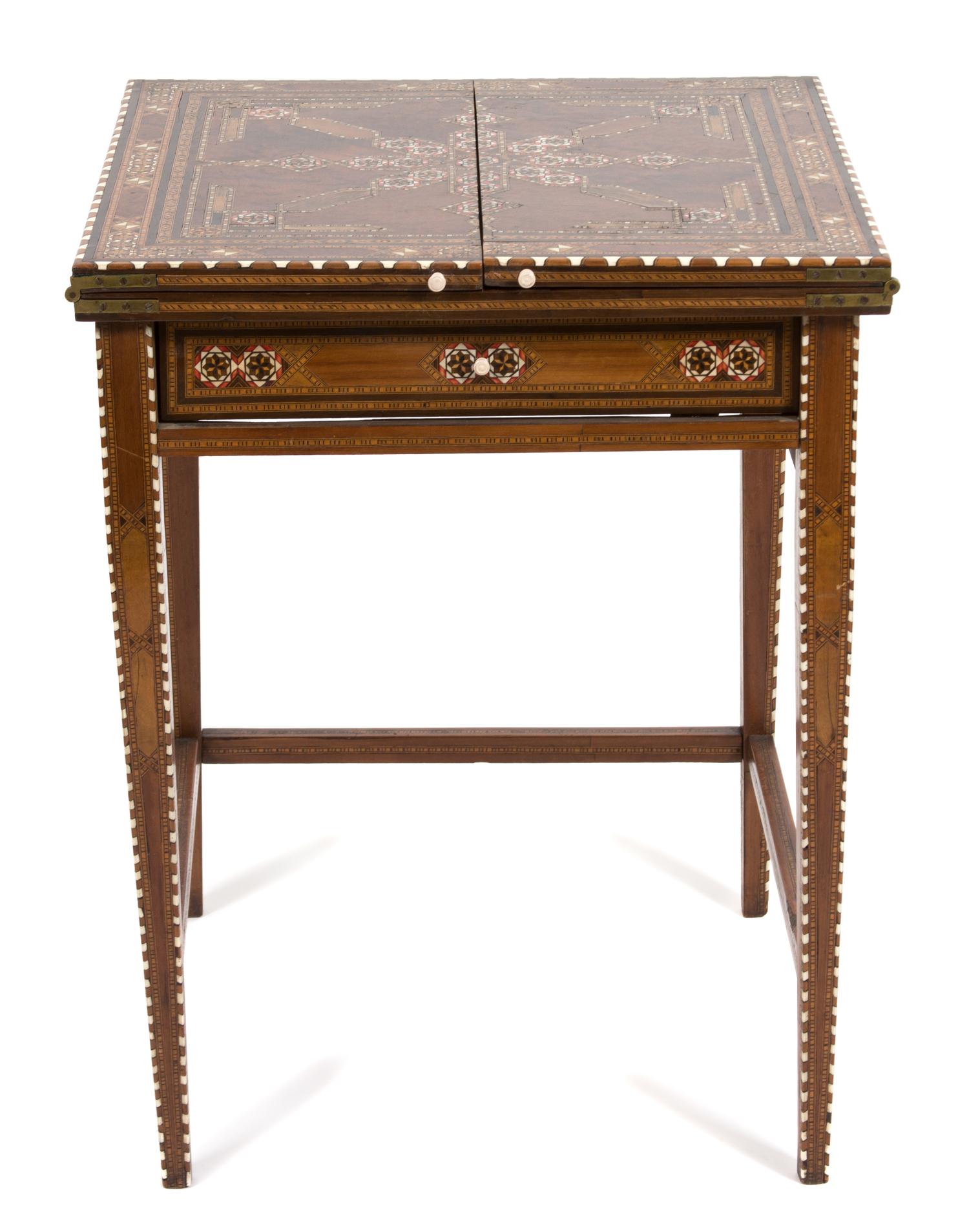 A Syrian Mother-of-Pearl, Bone, and Fruitwood Parquetry Inlaid Game Table Height 29 1/2 x width 23 x depth 23 inches.