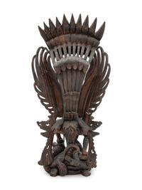 A Thai Carved Wood Figural Group of a Deity and Animals