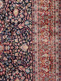 A Kirman Wool Rug