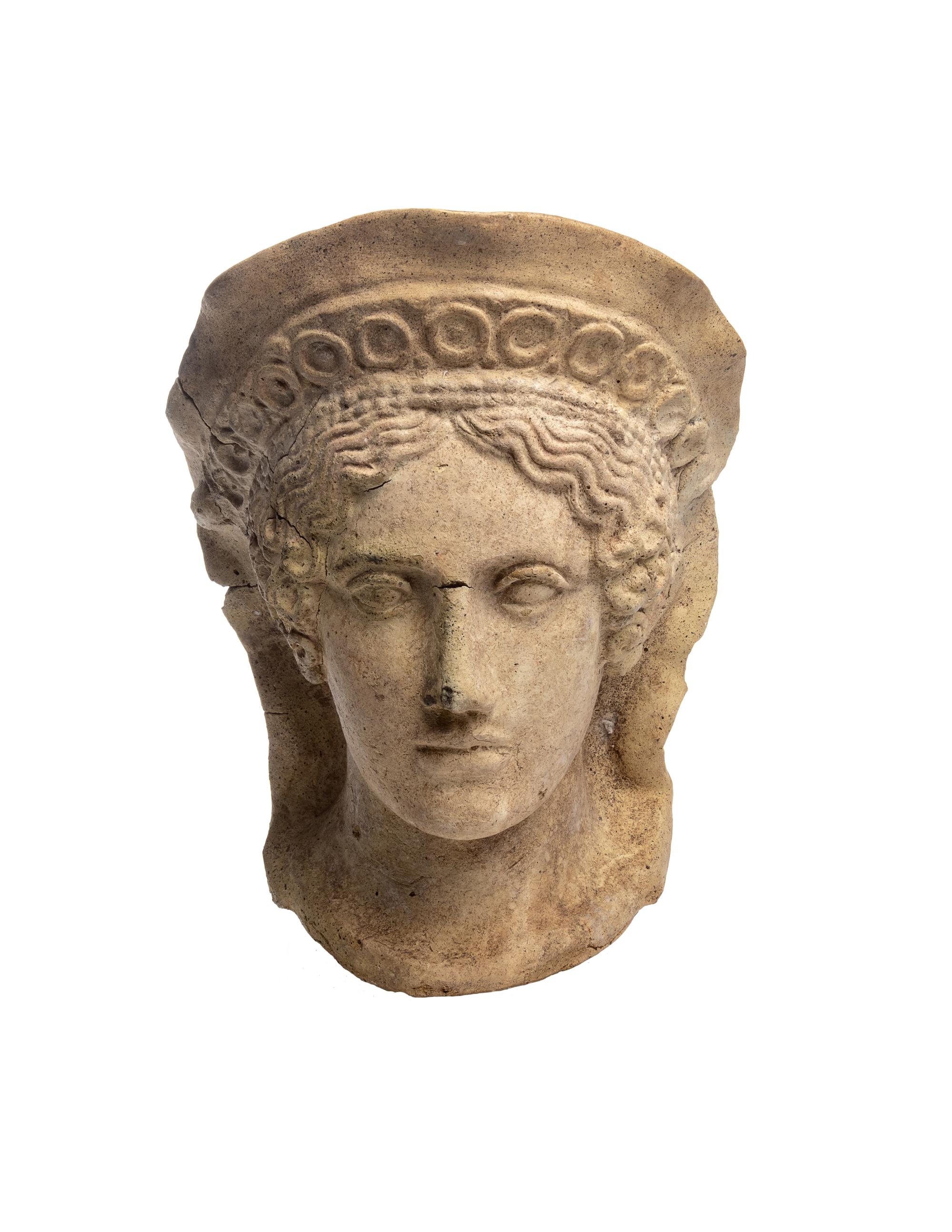 An Etruscan Terra Cotta Votive Head of a Veiled Woman