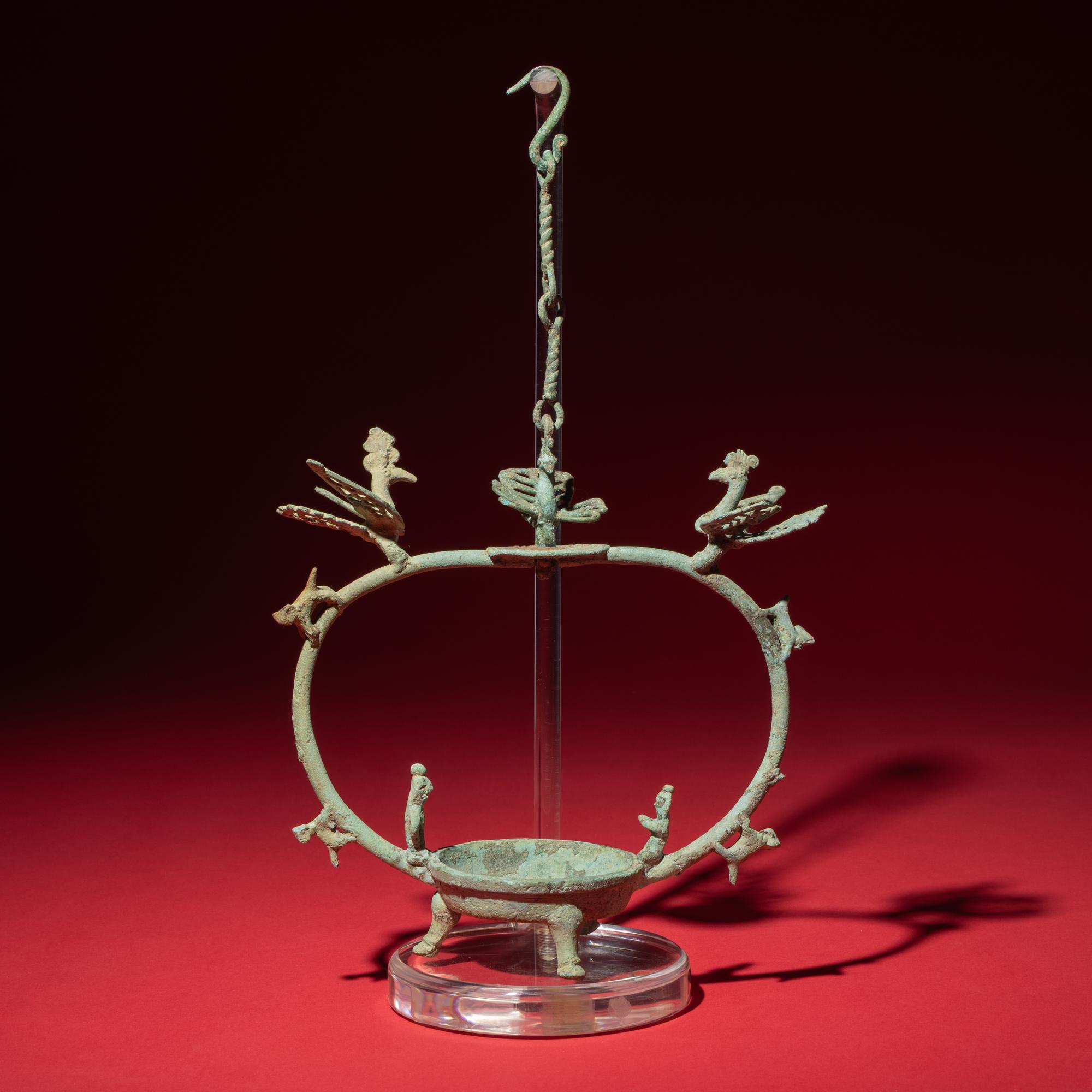 A Chinese Bronze 'Phoenix and Immortal' Hanging Oil Lamp, Eastern Han Dynasty — 東漢 青銅龍鳳神人懸燈