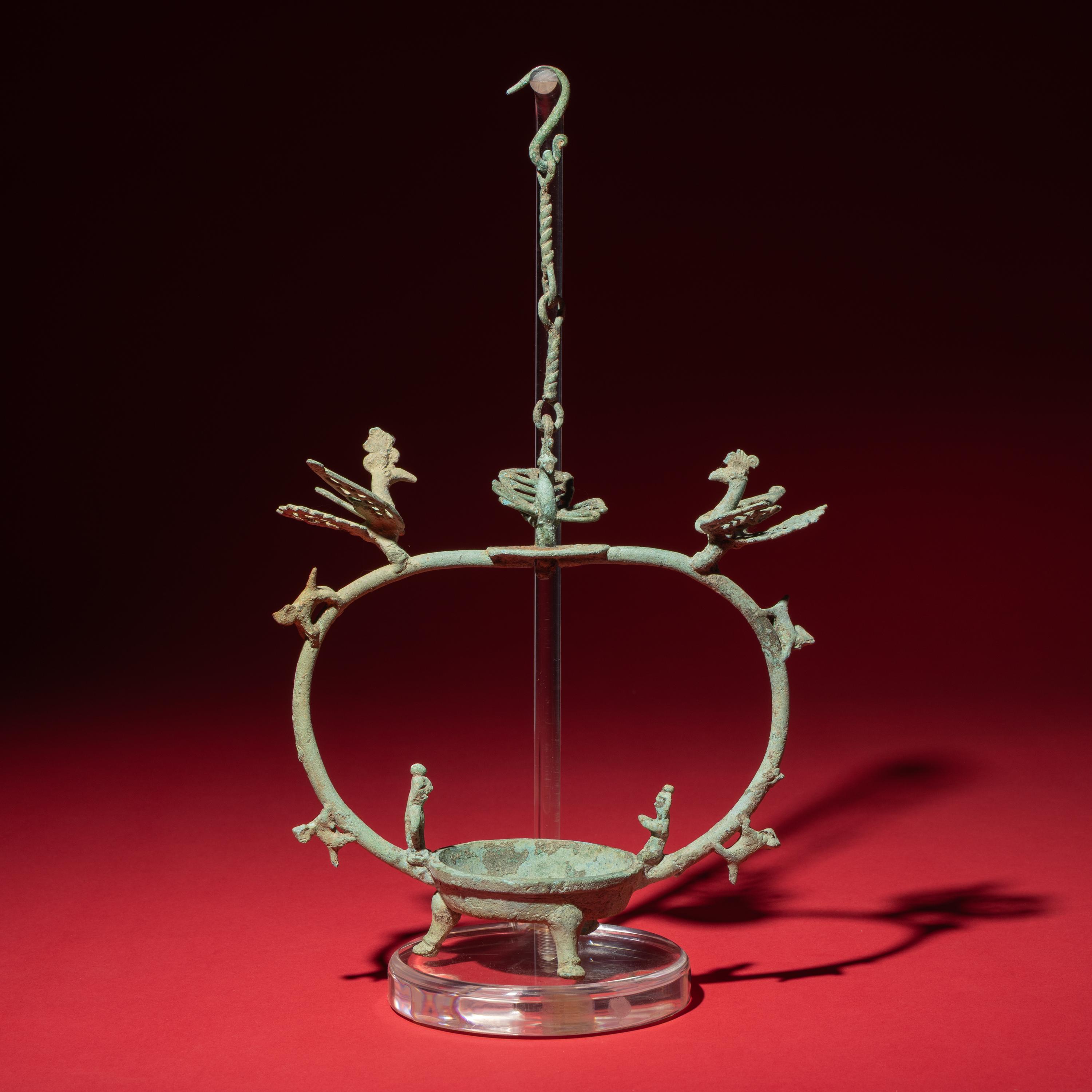 A Chinese Bronze 'Phoenix and Immortal' Hanging Oil Lamp, Eastern Han Dynasty — 東漢 青銅龍鳳神人懸燈