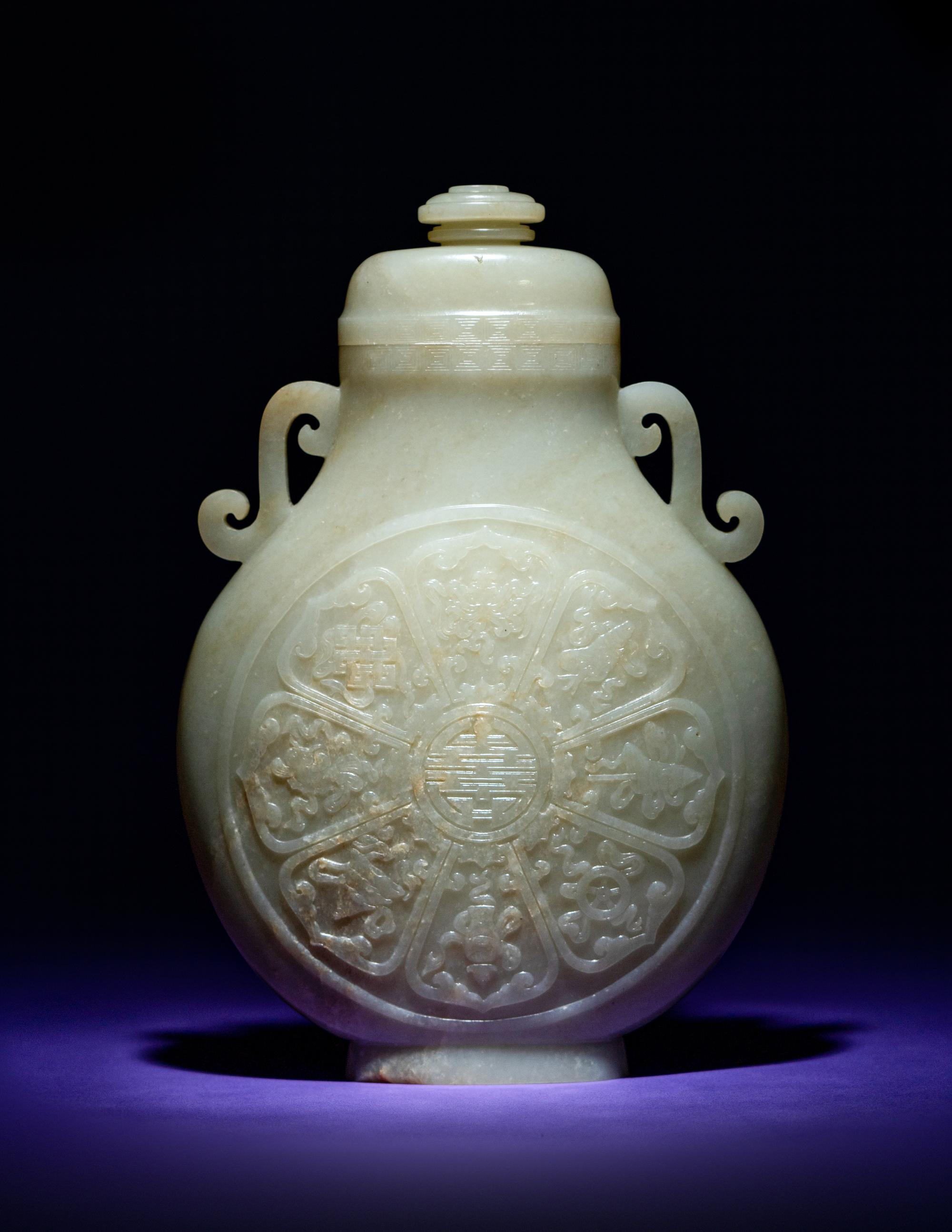 A Rare and Finely Carved Chinese White Jade Covered Vase