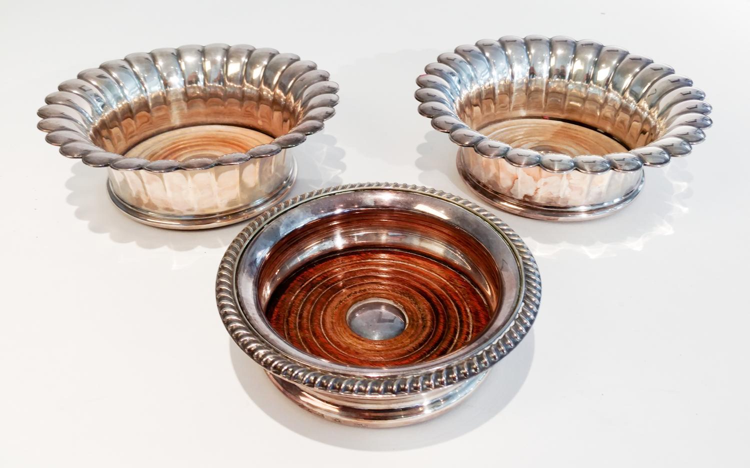 Three Silver Plate Wine Coasters