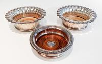 Three Silver Plate Wine Coasters