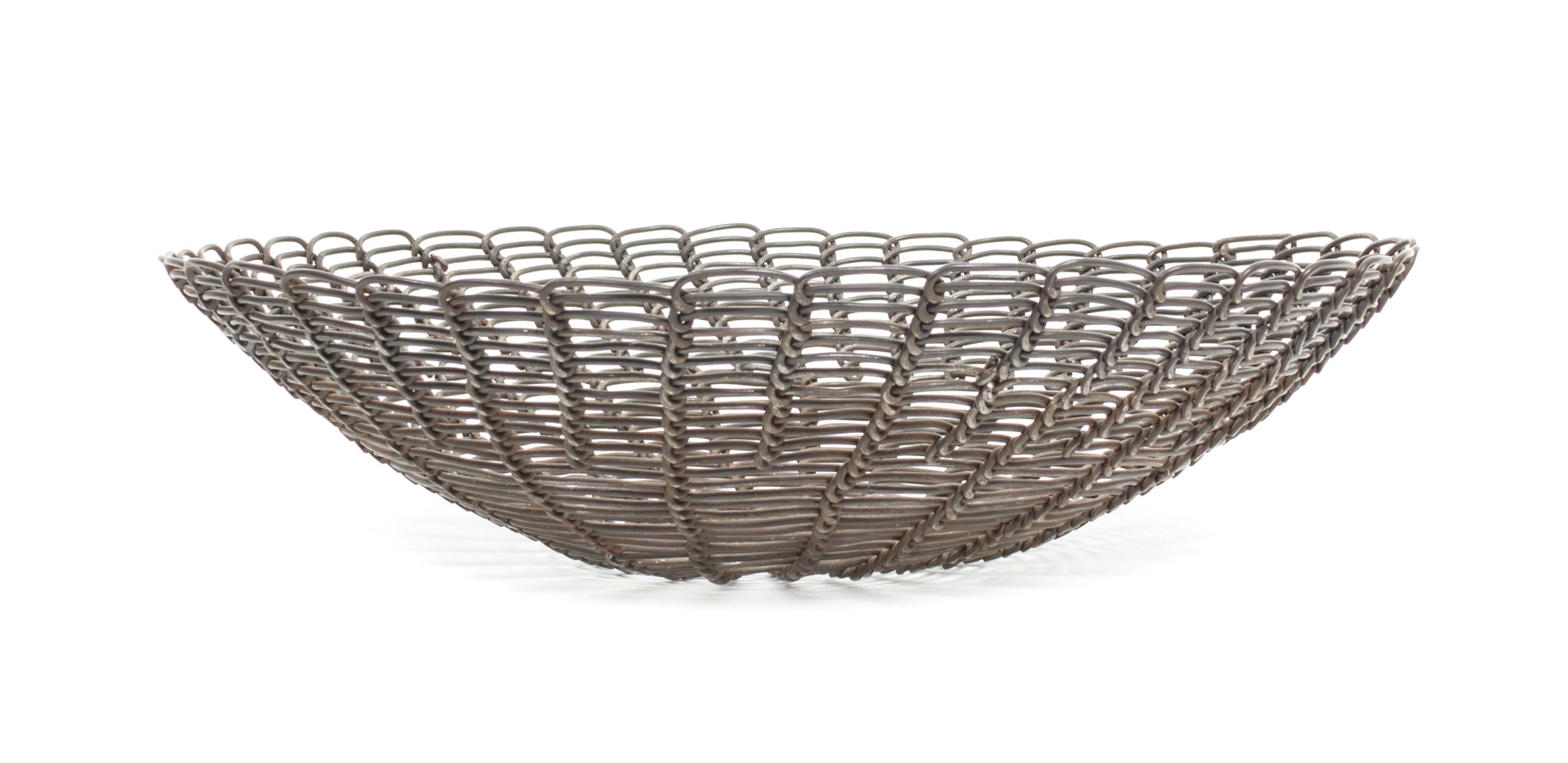 A Tohono O'odham Wire Basketry Bowl, Eugene Lopez Height 3 x diameter 11 3/4 inches.