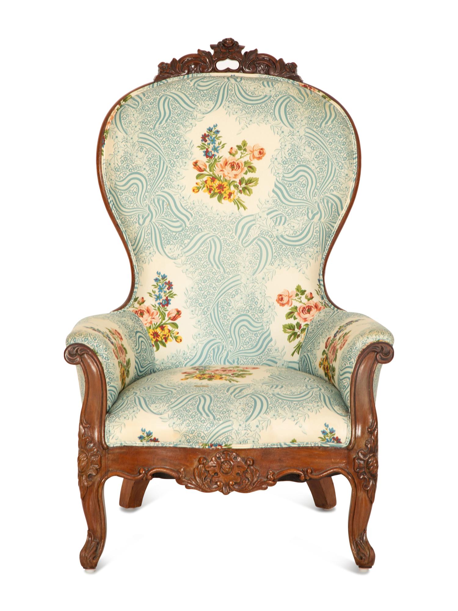 A Victorian Carved Mahogany Slipper Chair