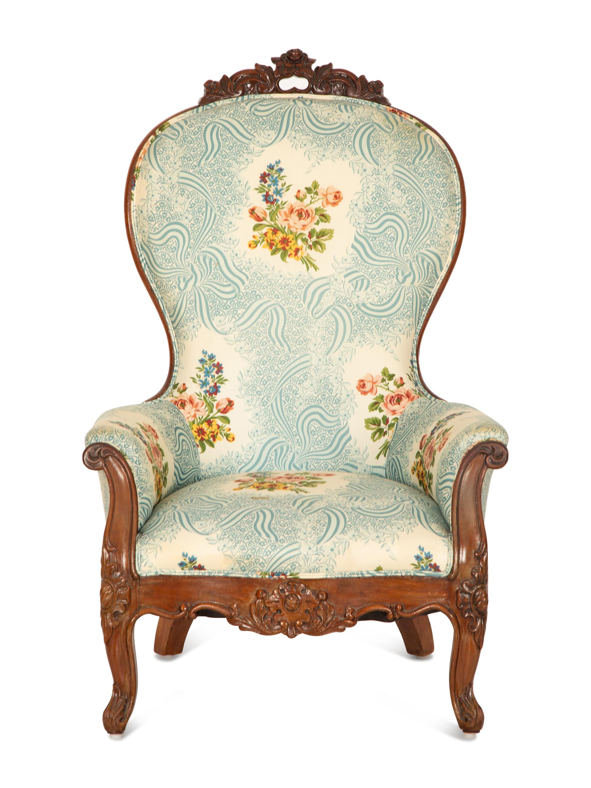 A Victorian Carved Mahogany Slipper Chair