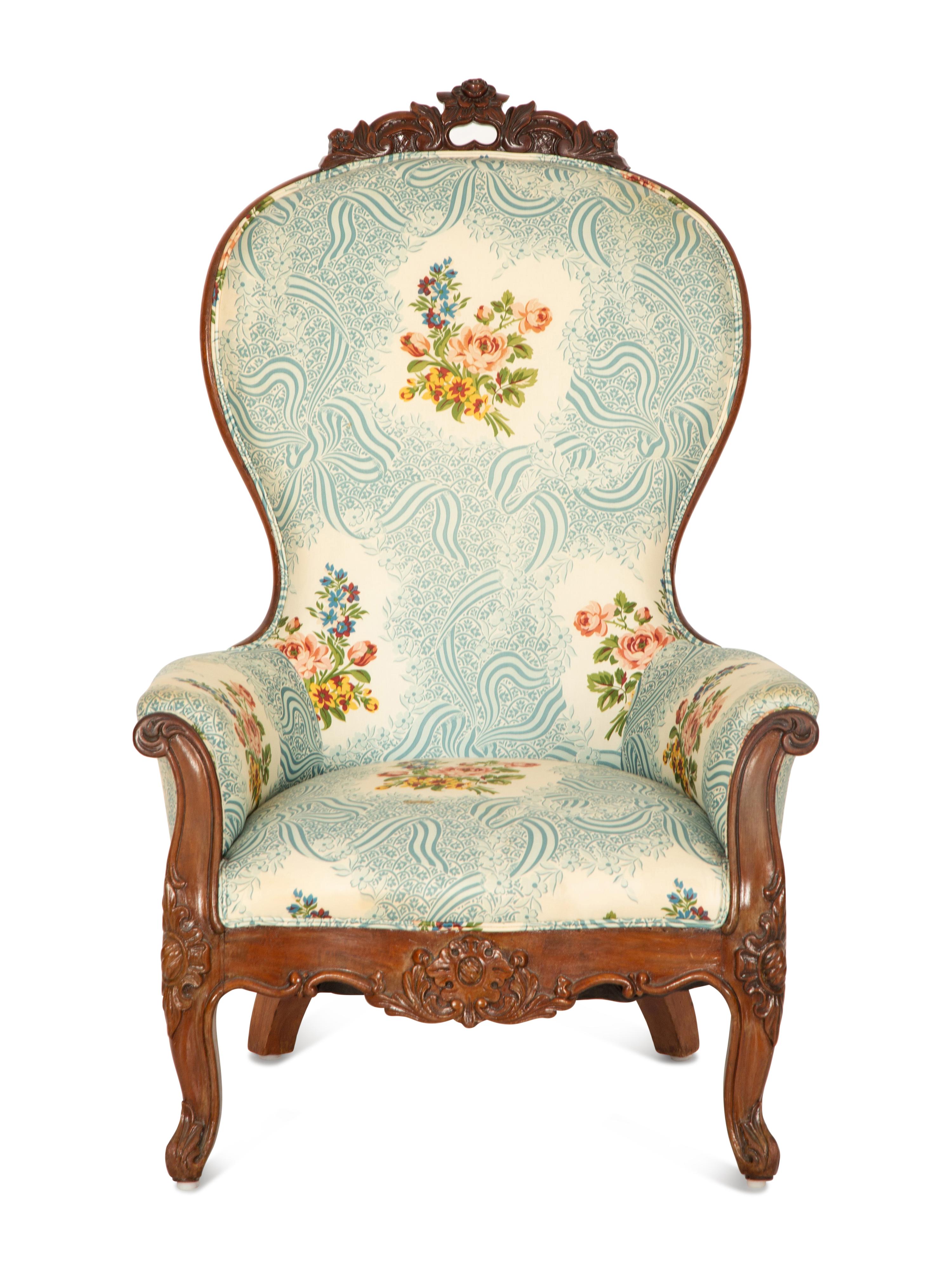 A Victorian Carved Mahogany Slipper Chair