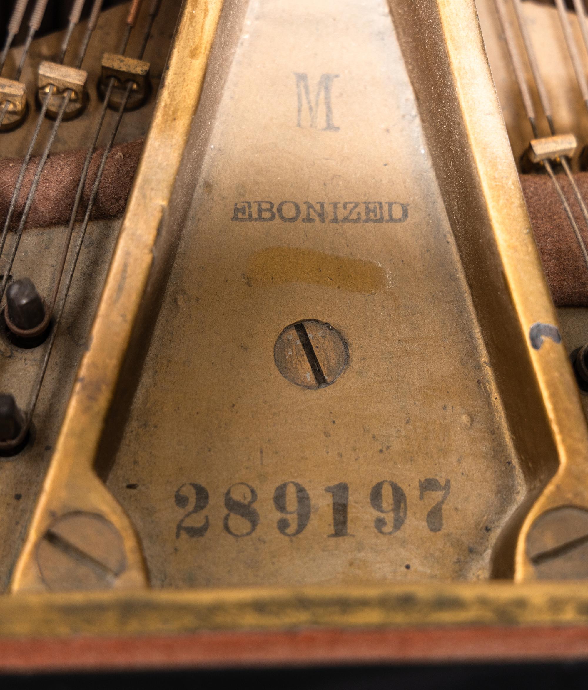 A Steinway and Sons Black Lacquer Model-M Grand Piano