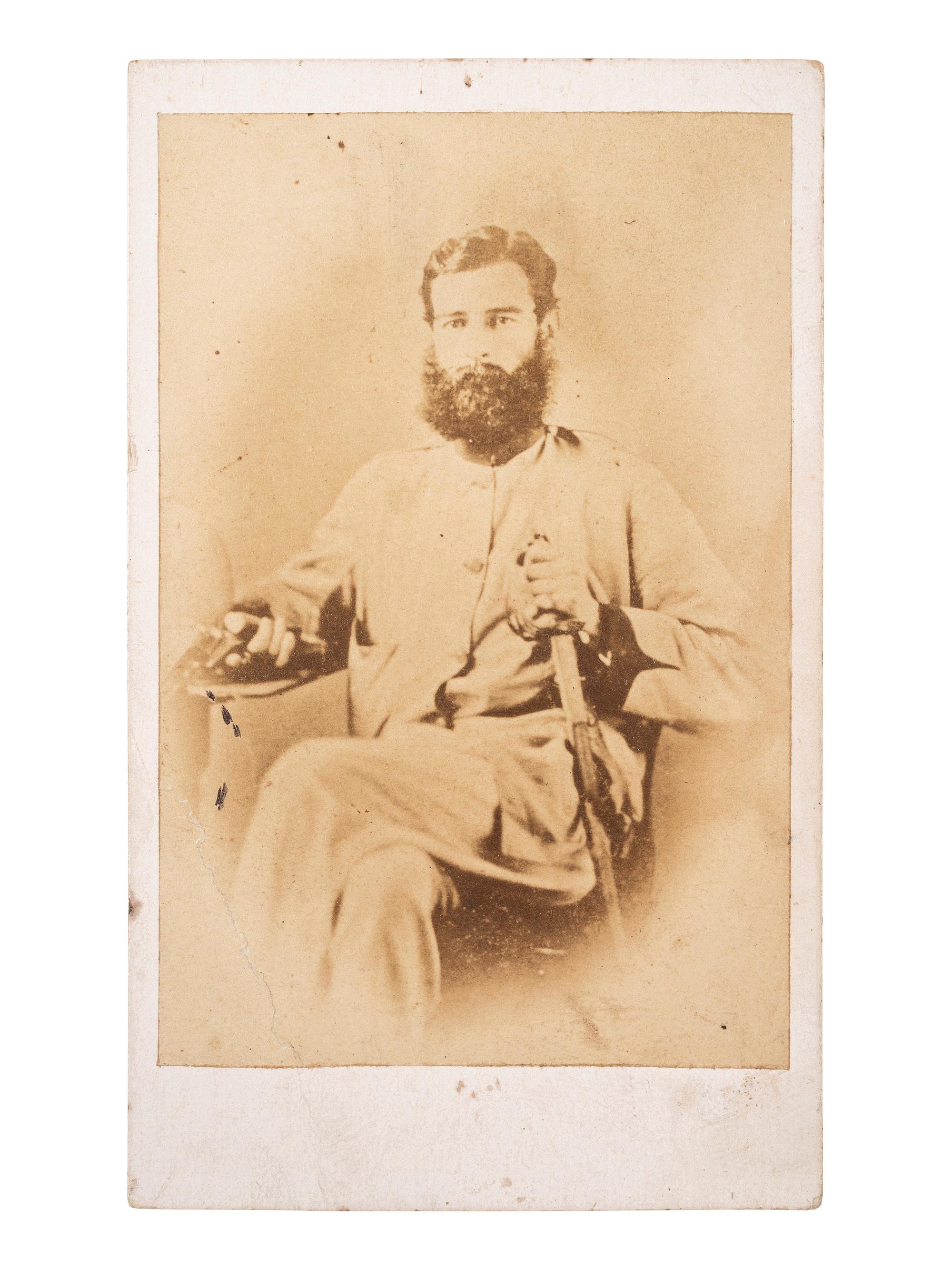 [EARLY PHOTOGRAPHY] -- [MILITARIA]. Half plate ambrotype of a double-armed British soldier with companion CDV. Ca 1857-1858.